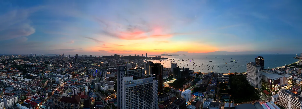 Aerial drone panorama of Pattaya Bay at sunset