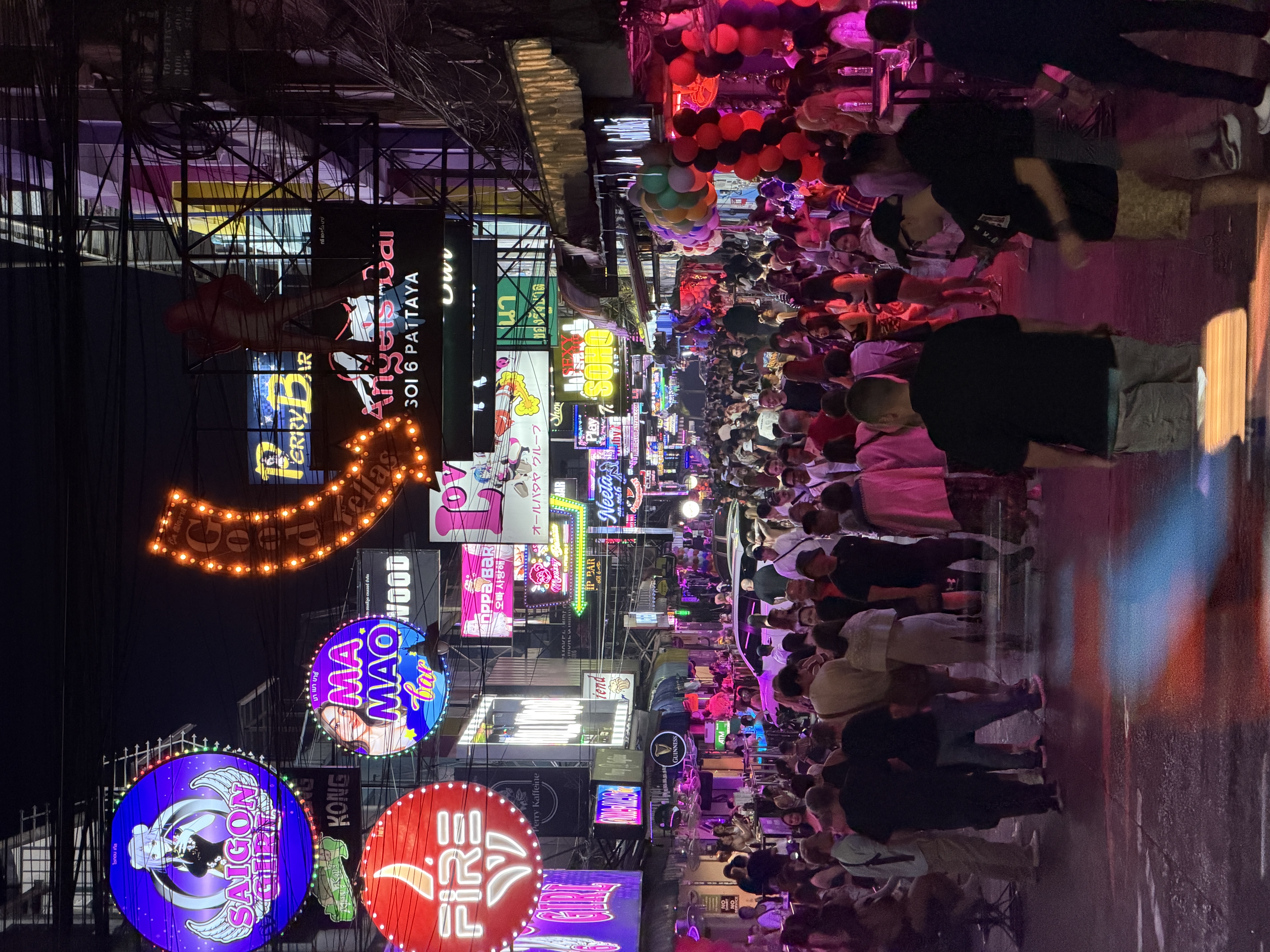 Vibrant Pattaya nightlife scene with neon lights